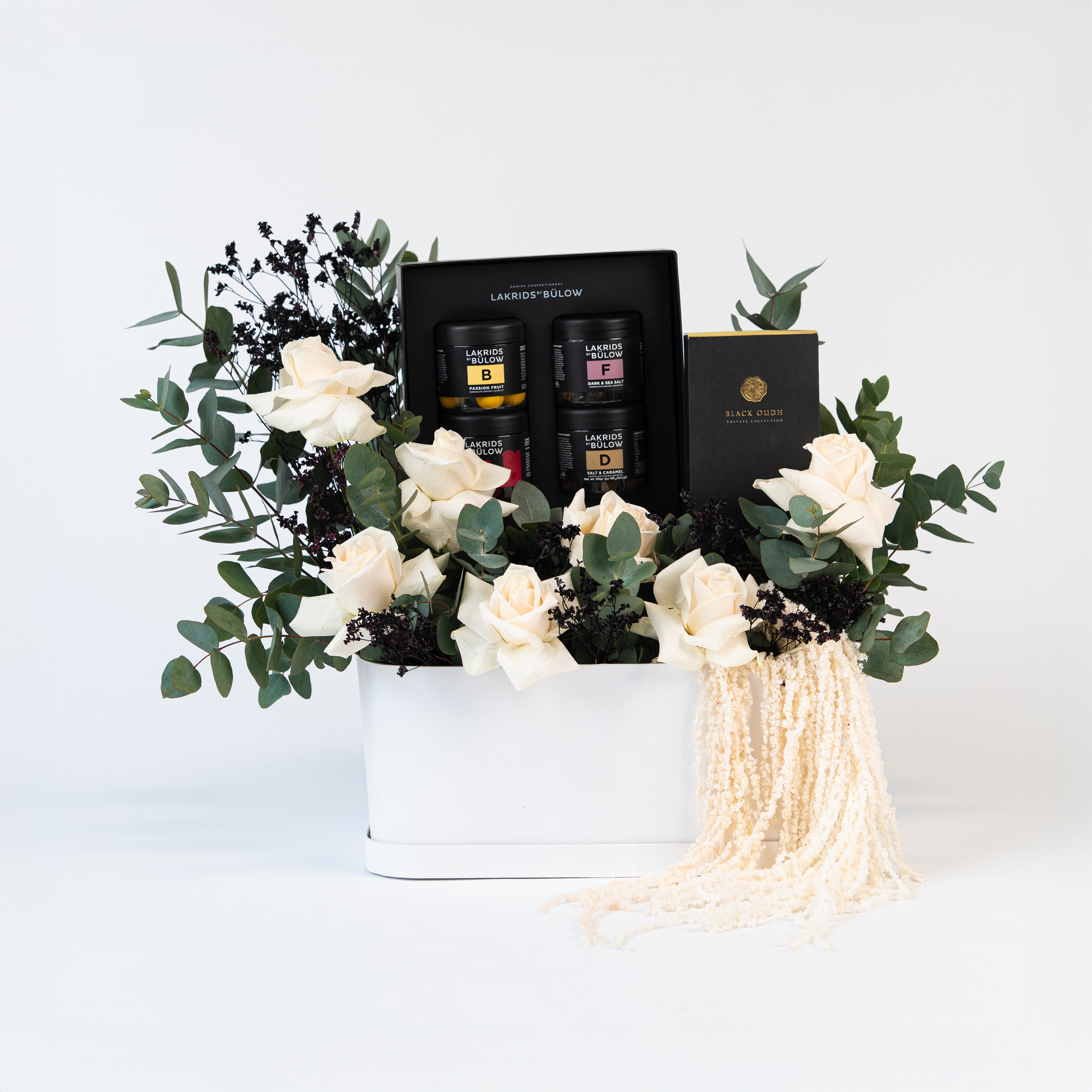 Hamper with tea set and gift boxes on a white background in dubai