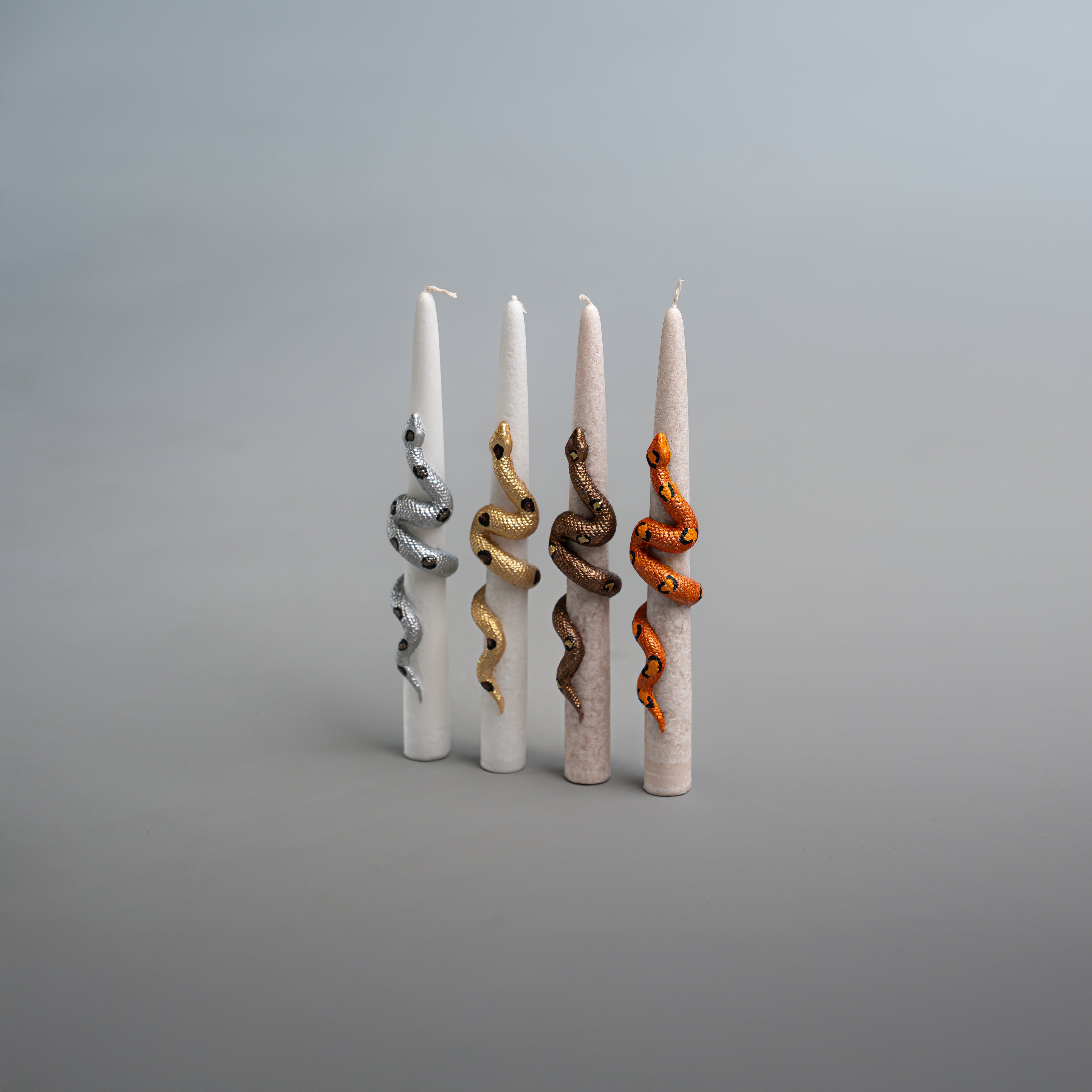 The Oroboros Tapers Collection