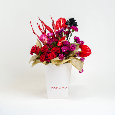 Protea flower bouquet UAE, Luxury gold wrapped flowers, Artistic floral arrangement Dubai , Red Anthurium and Rose gift, Premium Valentine’s delivery