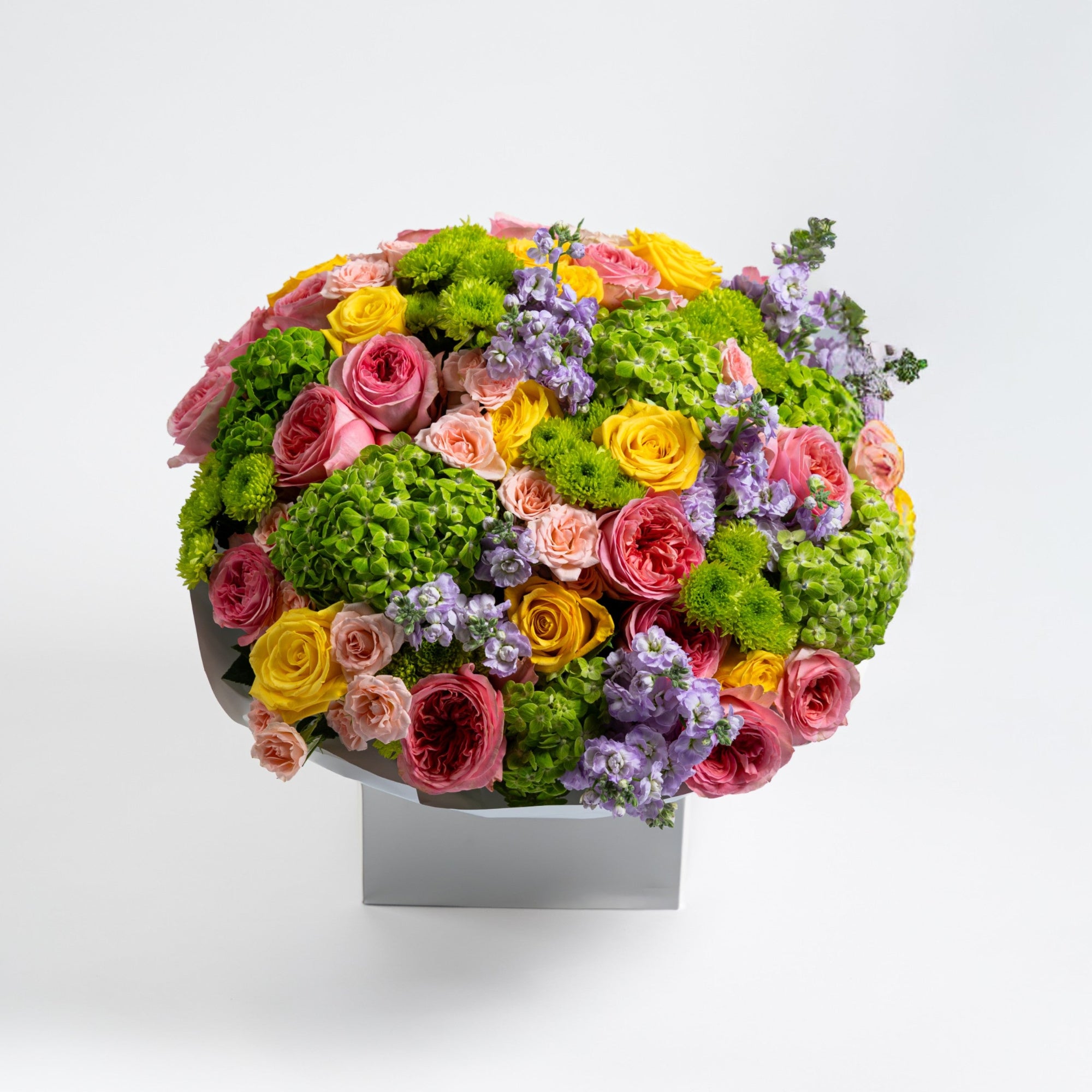 The Jardin Rhapsody luxury mixed flower bouquet with green hydrangeas and colourful roses by Papaya Flowers